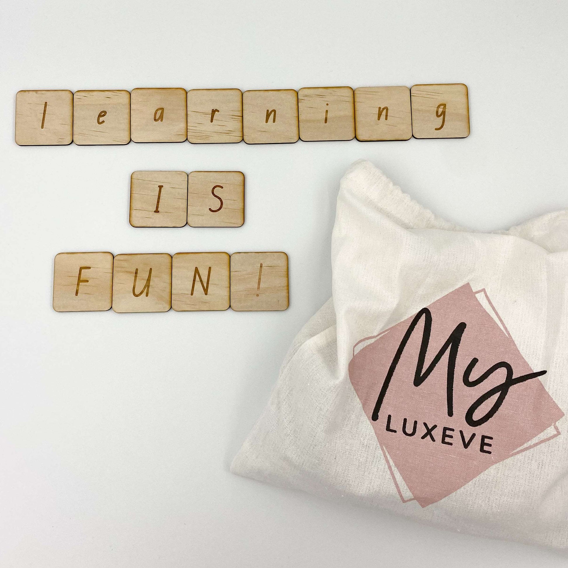 Learning is Fun spelt out in the tile pieces from the Alphabet and Number Tiles