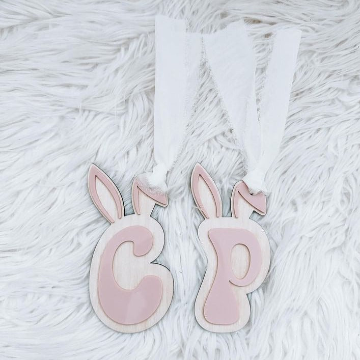 3D Initial Bunny Ear Tag with Frayed Ribbon laying flat