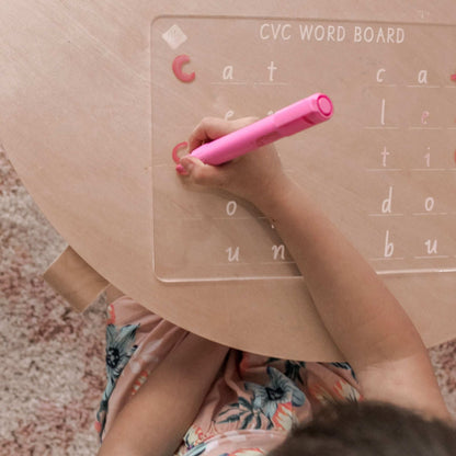 Image of Child with CVC Word Board in Use